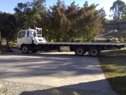 Hire Large Bogie Axle Tilt Tray - Carries up to 11 tonnes